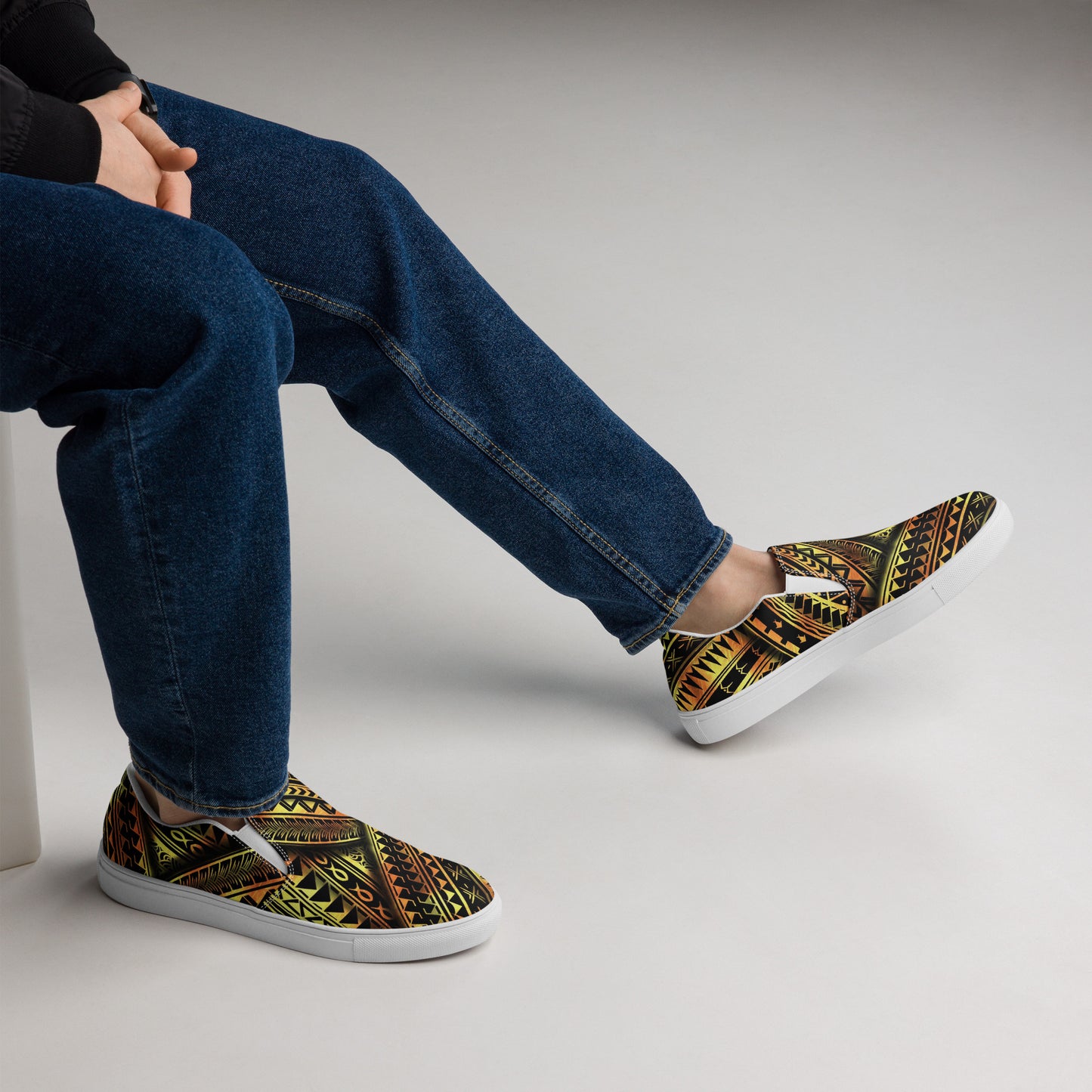 Gold on black slip-on canvas shoes